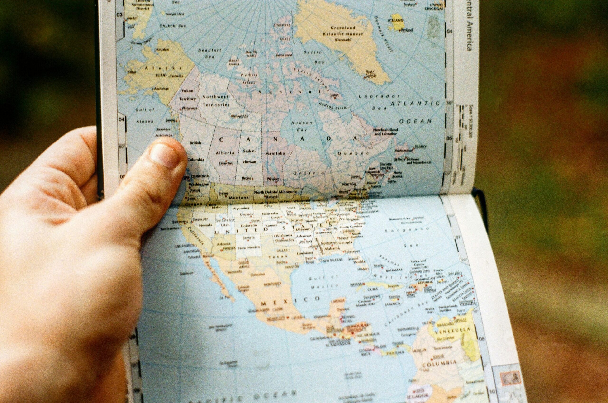 Illustration showing global map with warning signs over regions prone to political instability