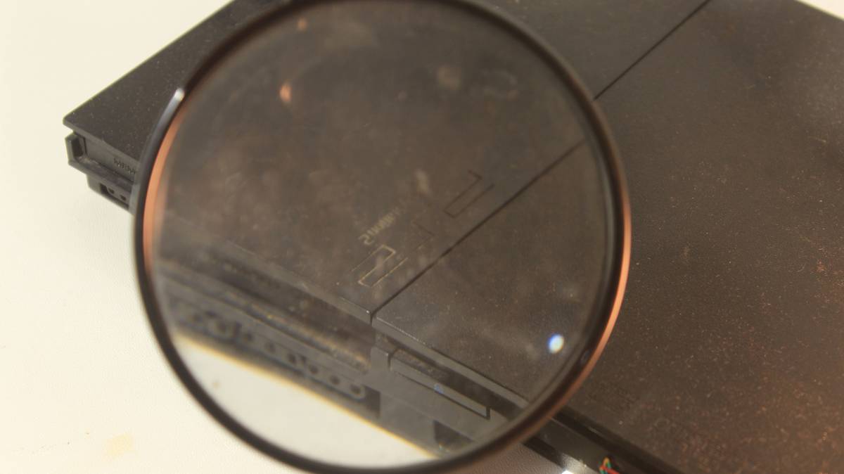Close-up shot of a traveler reviewing documents at an airport cafe.