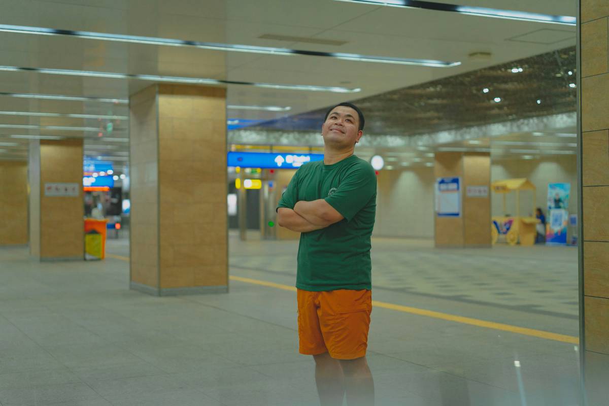 Traveller sitting alone near luggage